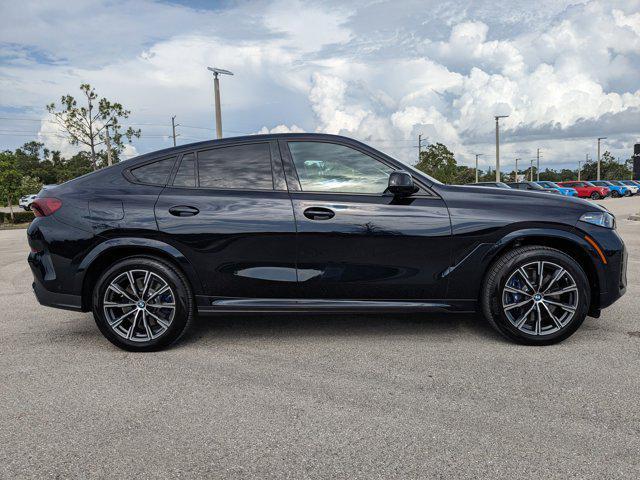 used 2024 BMW X6 car, priced at $74,990