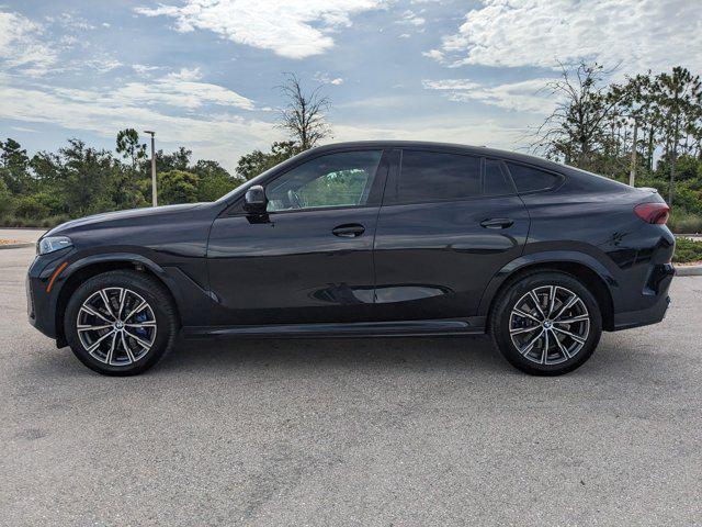 used 2024 BMW X6 car, priced at $74,990