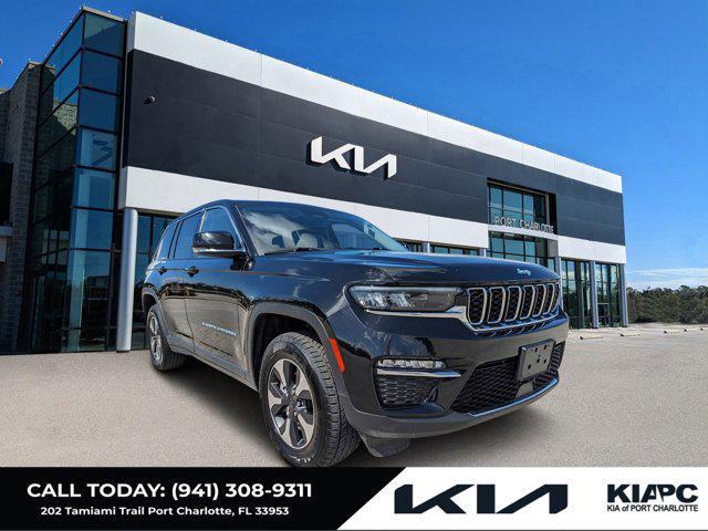 used 2023 Jeep Grand Cherokee 4xe car, priced at $24,392