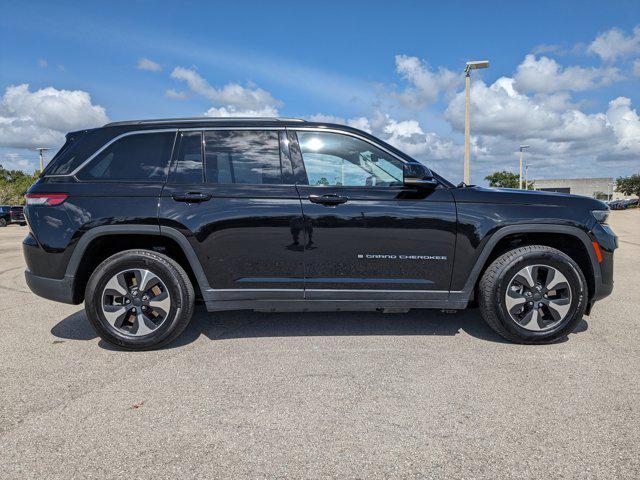 used 2023 Jeep Grand Cherokee 4xe car, priced at $24,392