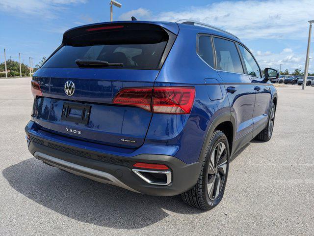 used 2024 Volkswagen Taos car, priced at $22,996