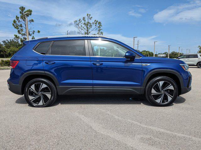 used 2024 Volkswagen Taos car, priced at $22,996