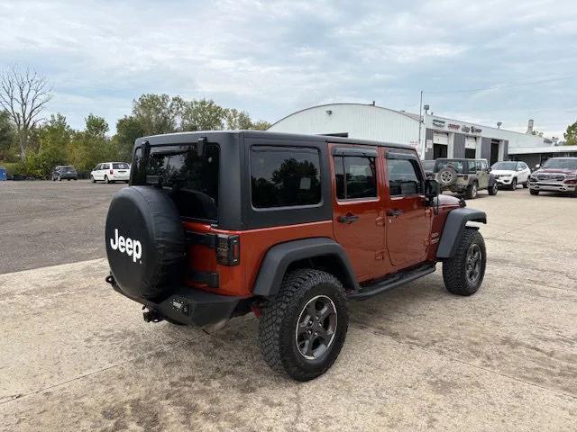 used 2014 Jeep Wrangler Unlimited car, priced at $15,900
