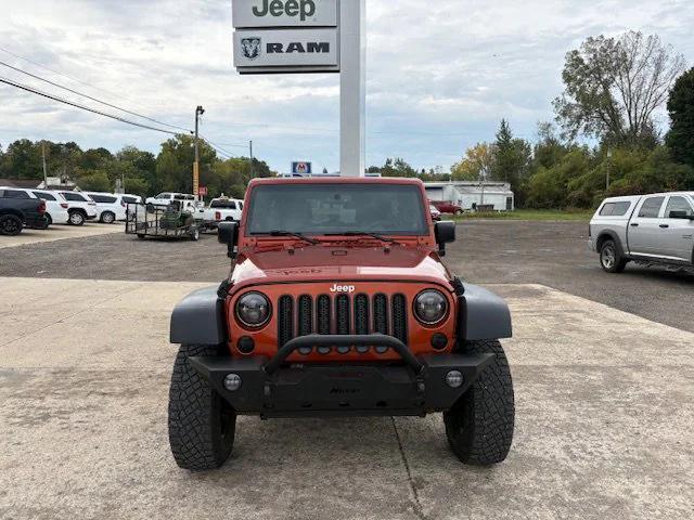 used 2014 Jeep Wrangler Unlimited car, priced at $15,900