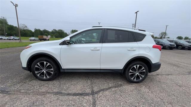 used 2015 Toyota RAV4 car, priced at $14,999