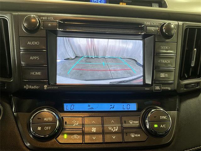 used 2015 Toyota RAV4 car, priced at $14,999