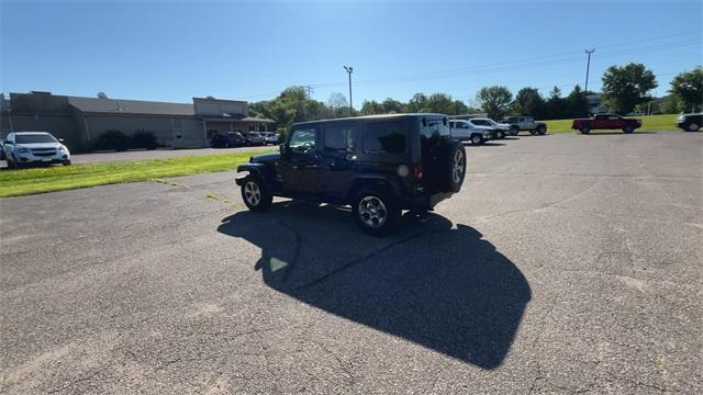 used 2016 Jeep Wrangler Unlimited car, priced at $20,749