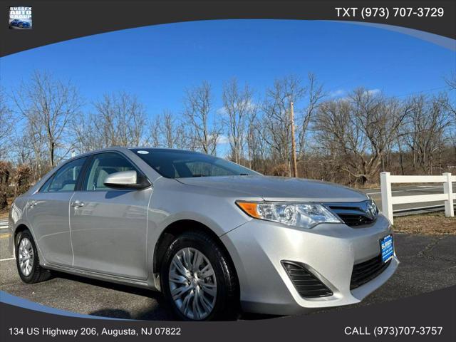 used 2013 Toyota Camry car, priced at $13,990