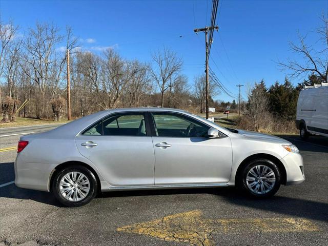 used 2013 Toyota Camry car, priced at $13,990