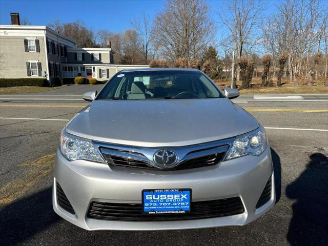 used 2013 Toyota Camry car, priced at $13,990