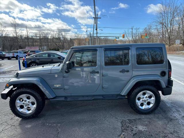 used 2015 Jeep Wrangler Unlimited car, priced at $14,990