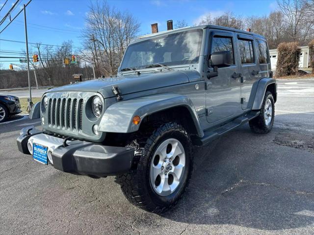 used 2015 Jeep Wrangler Unlimited car, priced at $14,990