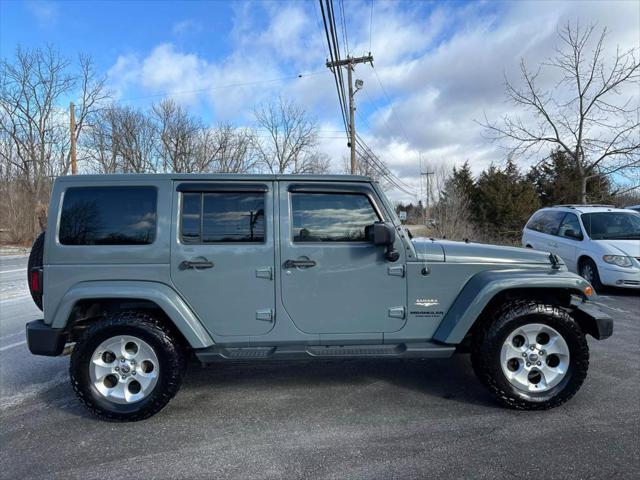 used 2015 Jeep Wrangler Unlimited car, priced at $14,990