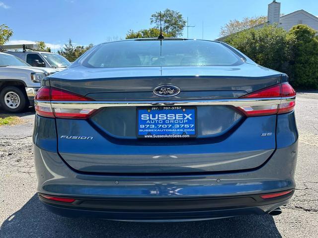 used 2018 Ford Fusion car, priced at $11,990