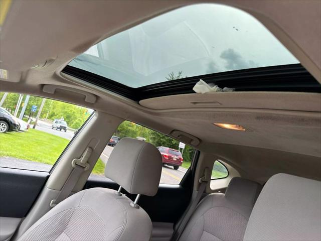 used 2013 Nissan Rogue car, priced at $6,990