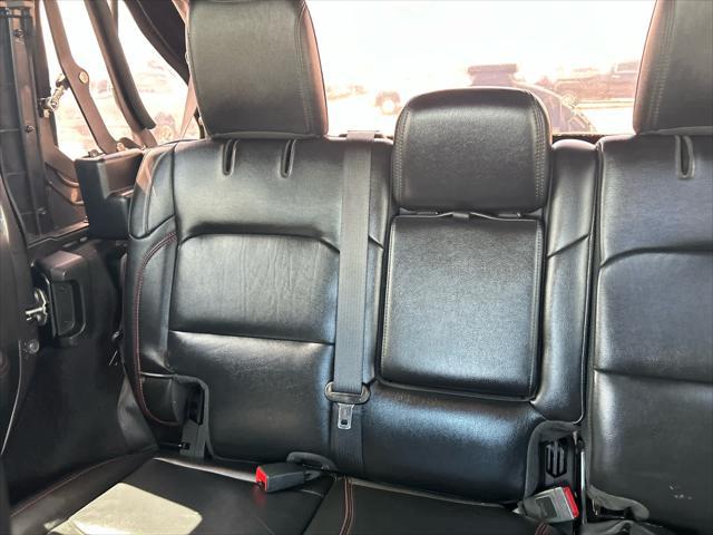 used 2021 Jeep Wrangler Unlimited car, priced at $36,298