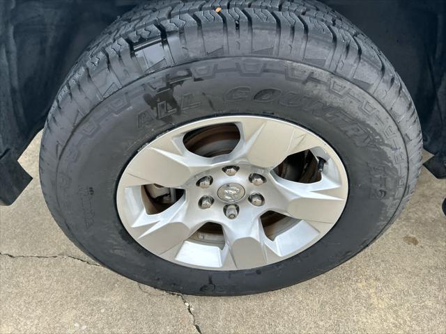 used 2019 Ram 1500 car, priced at $27,587