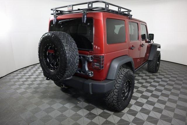 used 2013 Jeep Wrangler Unlimited car, priced at $23,695