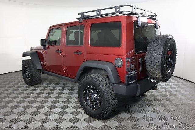 used 2013 Jeep Wrangler Unlimited car, priced at $23,695