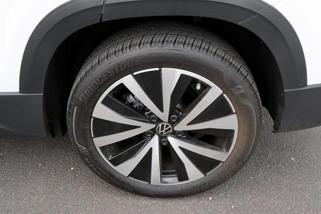 used 2024 Volkswagen Taos car, priced at $23,205