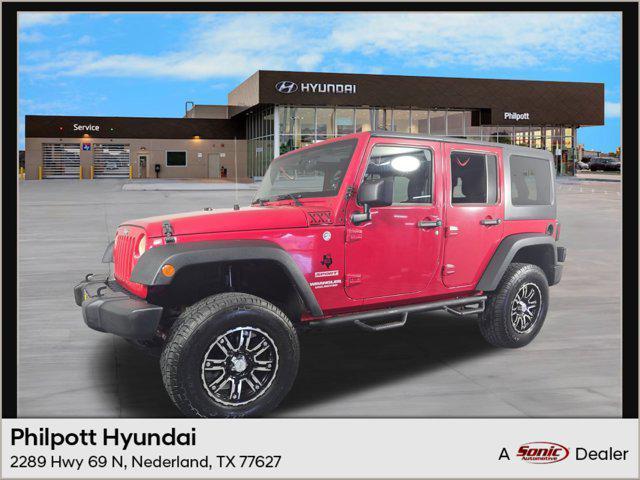 used 2012 Jeep Wrangler Unlimited car, priced at $14,699