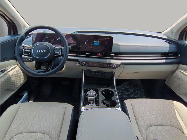 new 2025 Kia Carnival Hybrid car, priced at $46,387