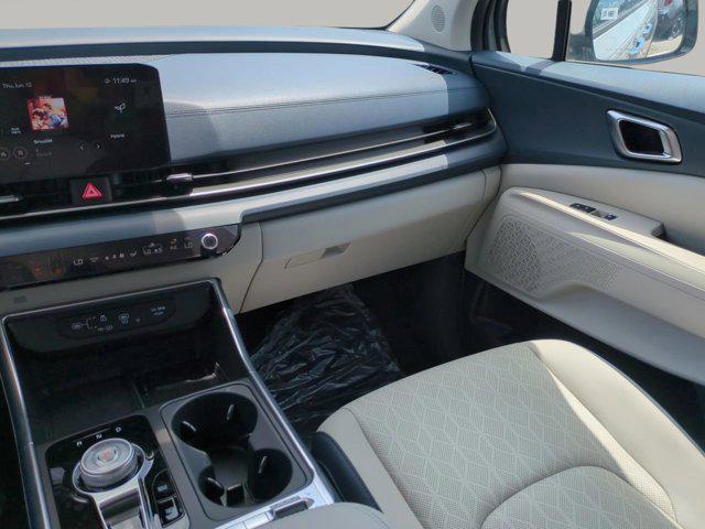 new 2025 Kia Carnival Hybrid car, priced at $46,387