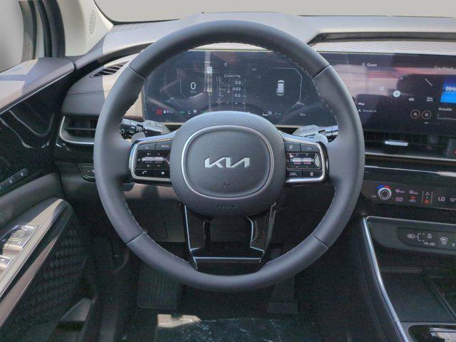new 2025 Kia Carnival Hybrid car, priced at $53,174
