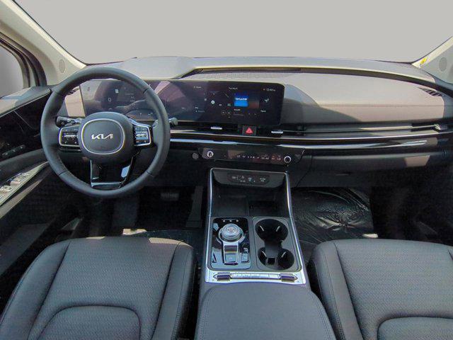 new 2025 Kia Carnival Hybrid car, priced at $53,174