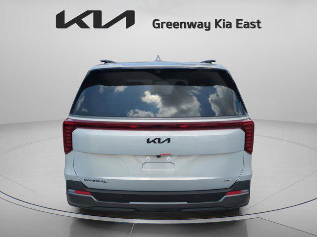 new 2025 Kia Carnival Hybrid car, priced at $53,174