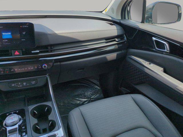 new 2025 Kia Carnival Hybrid car, priced at $53,174