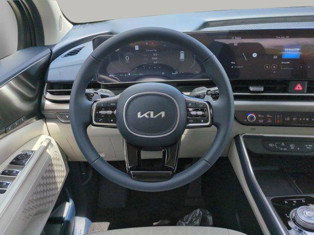 new 2025 Kia Carnival Hybrid car, priced at $47,196