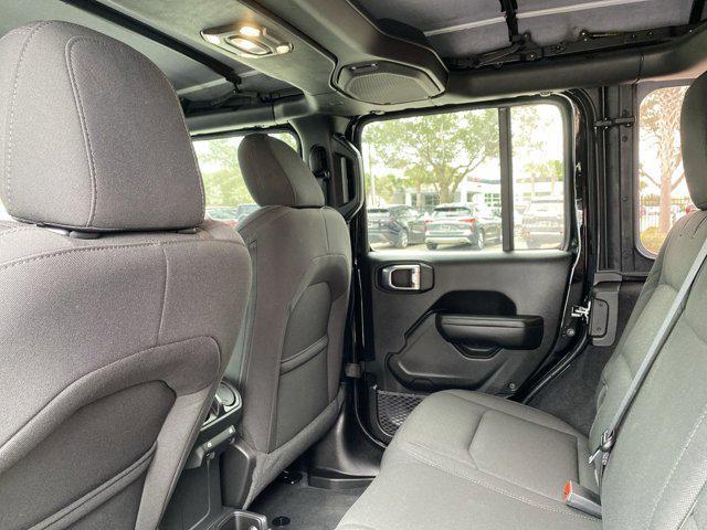 used 2023 Jeep Wrangler car, priced at $33,741