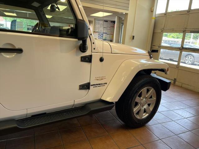 used 2013 Jeep Wrangler Unlimited car, priced at $14,888