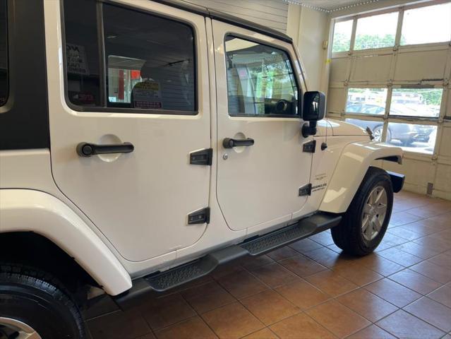 used 2013 Jeep Wrangler Unlimited car, priced at $14,888