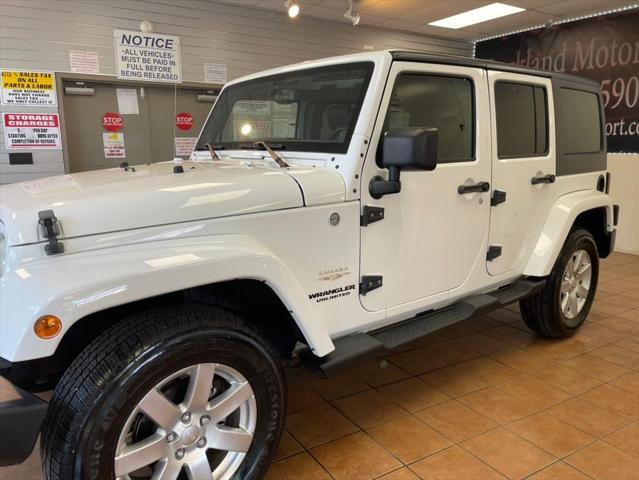 used 2013 Jeep Wrangler Unlimited car, priced at $14,888