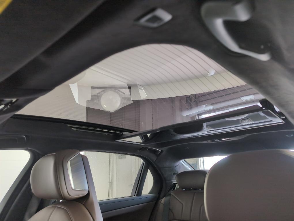 new 2025 BMW 740 car, priced at $125,420
