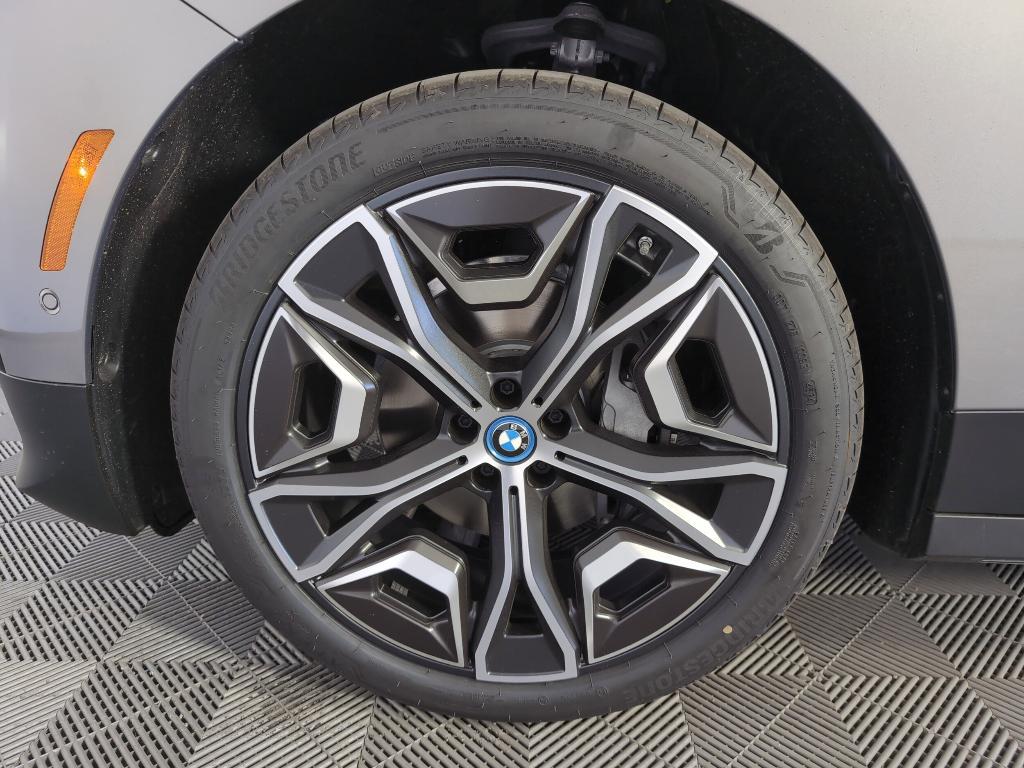 new 2025 BMW iX car, priced at $99,770