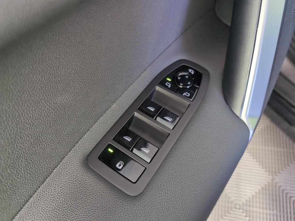 new 2025 BMW iX car, priced at $102,120