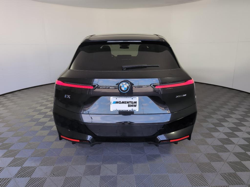 new 2025 BMW iX car, priced at $102,120