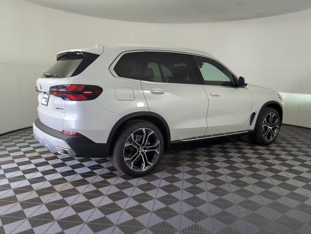 used 2026 BMW X5 car, priced at $70,051
