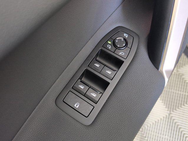 new 2026 BMW iX car, priced at $82,025