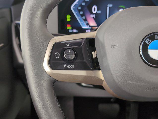 new 2026 BMW iX car, priced at $82,025