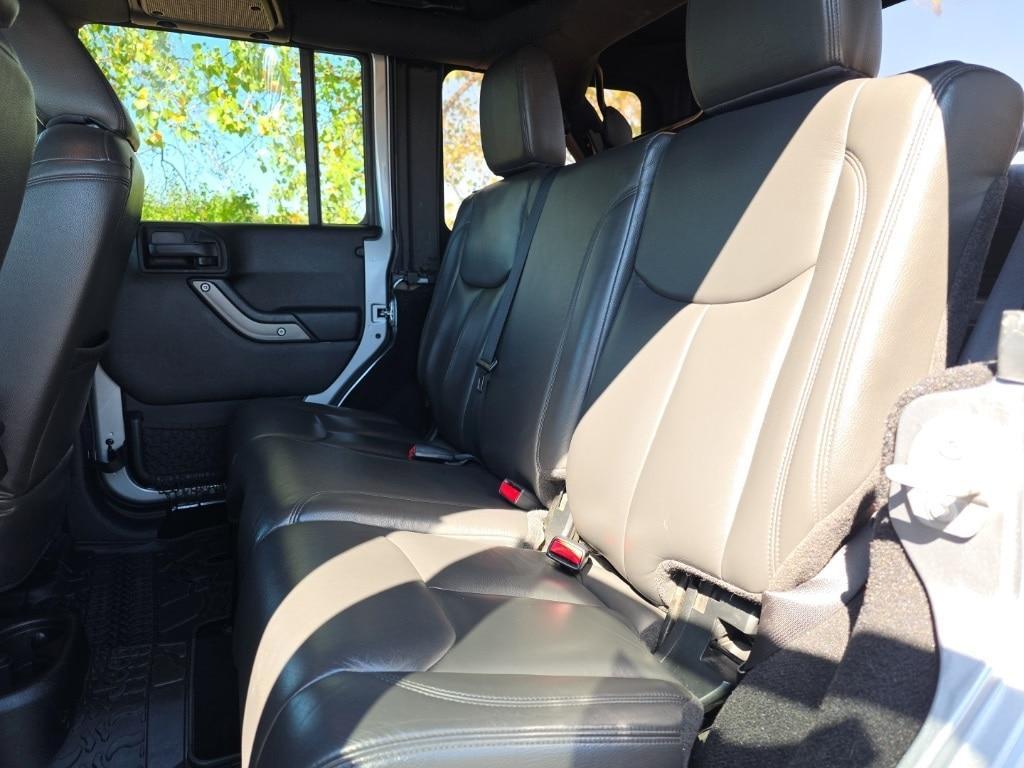 used 2016 Jeep Wrangler Unlimited car, priced at $19,497