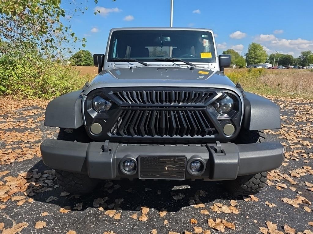 used 2016 Jeep Wrangler Unlimited car, priced at $19,497