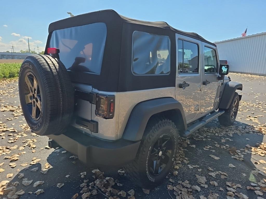 used 2016 Jeep Wrangler Unlimited car, priced at $19,497