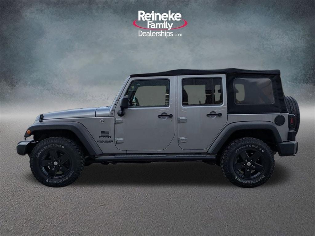 used 2016 Jeep Wrangler Unlimited car, priced at $16,975