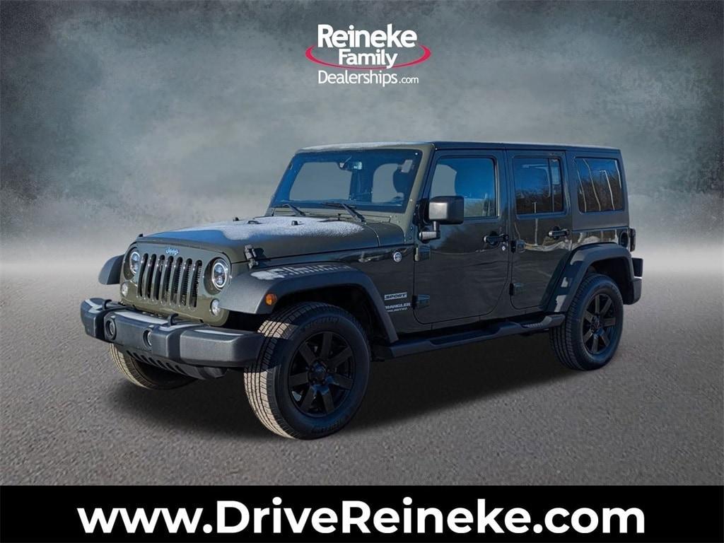 used 2015 Jeep Wrangler Unlimited car, priced at $13,218