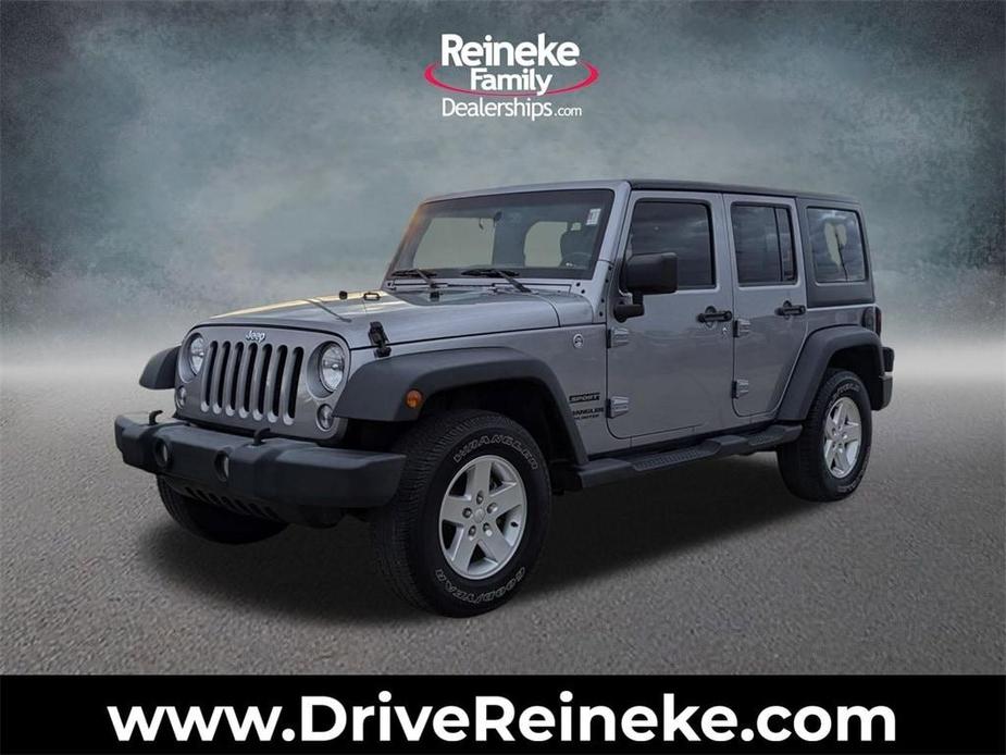 used 2017 Jeep Wrangler Unlimited car, priced at $21,933