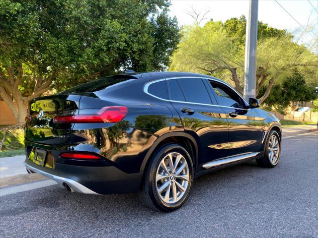 used 2019 BMW X4 car, priced at $23,900